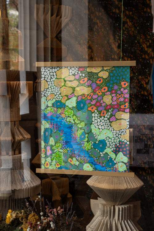 "Groovy Floral Meadow" abstract painting by Pollen Price (@BostonPollen) hanging in the Harvard Coop window display of "For Love of Nature and Literature"