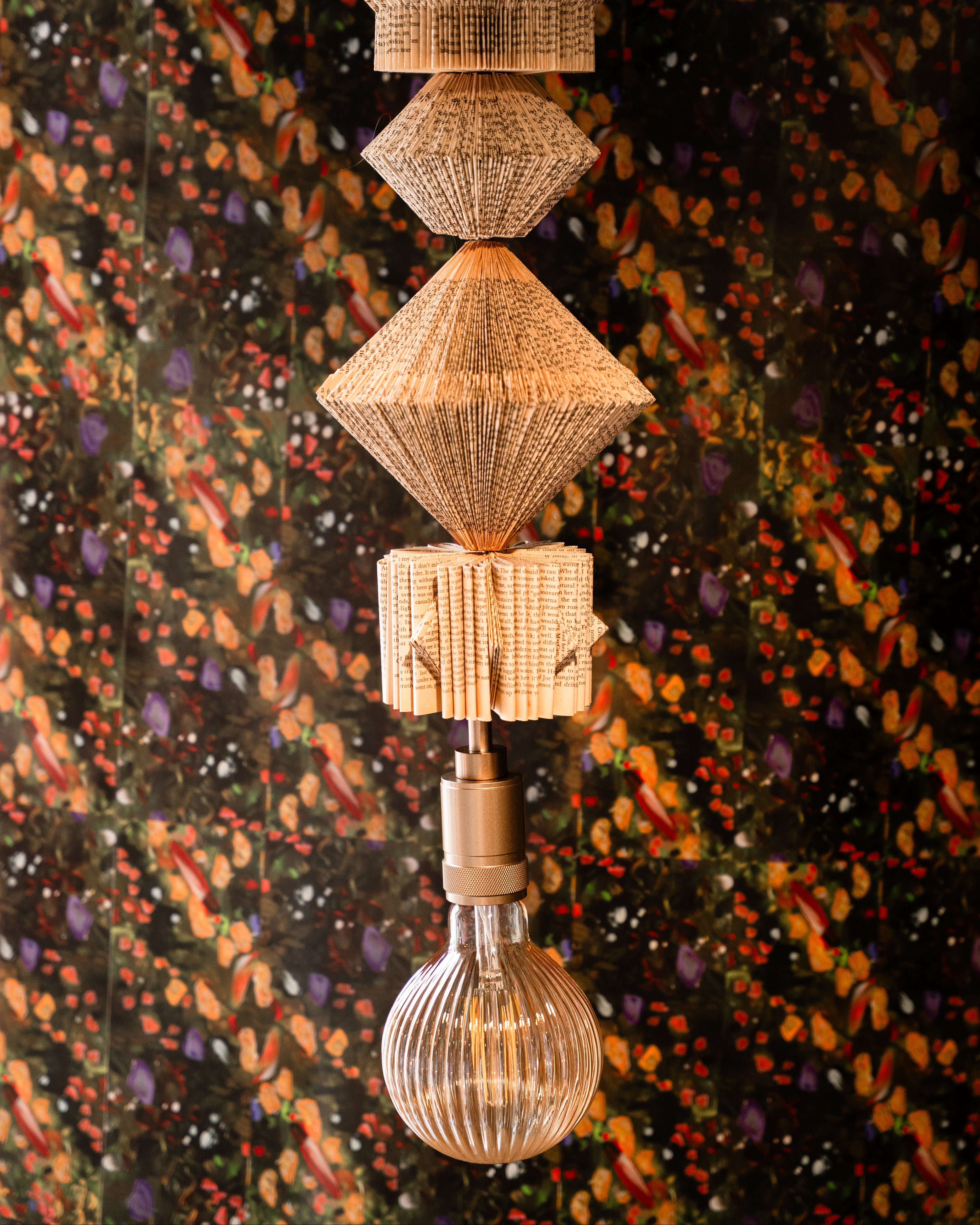 Hand crafted pendant light made from folded books by Pollen Price (@BostonPollen)